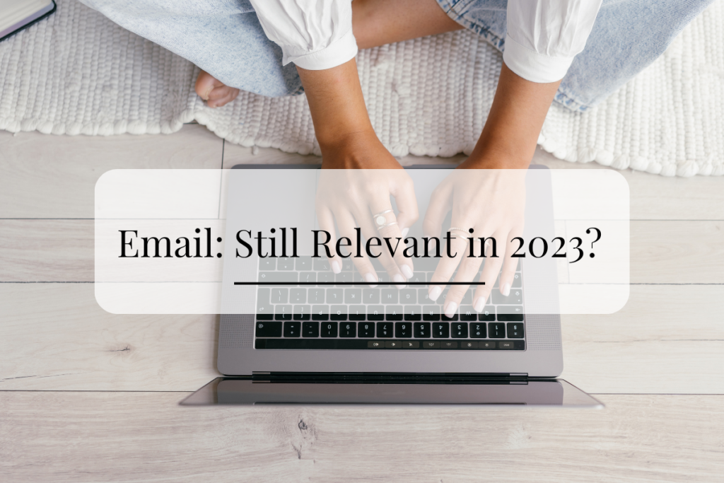 Email: Still relevant iin 2023? Photo of girl sitting on floor typing on a laptop